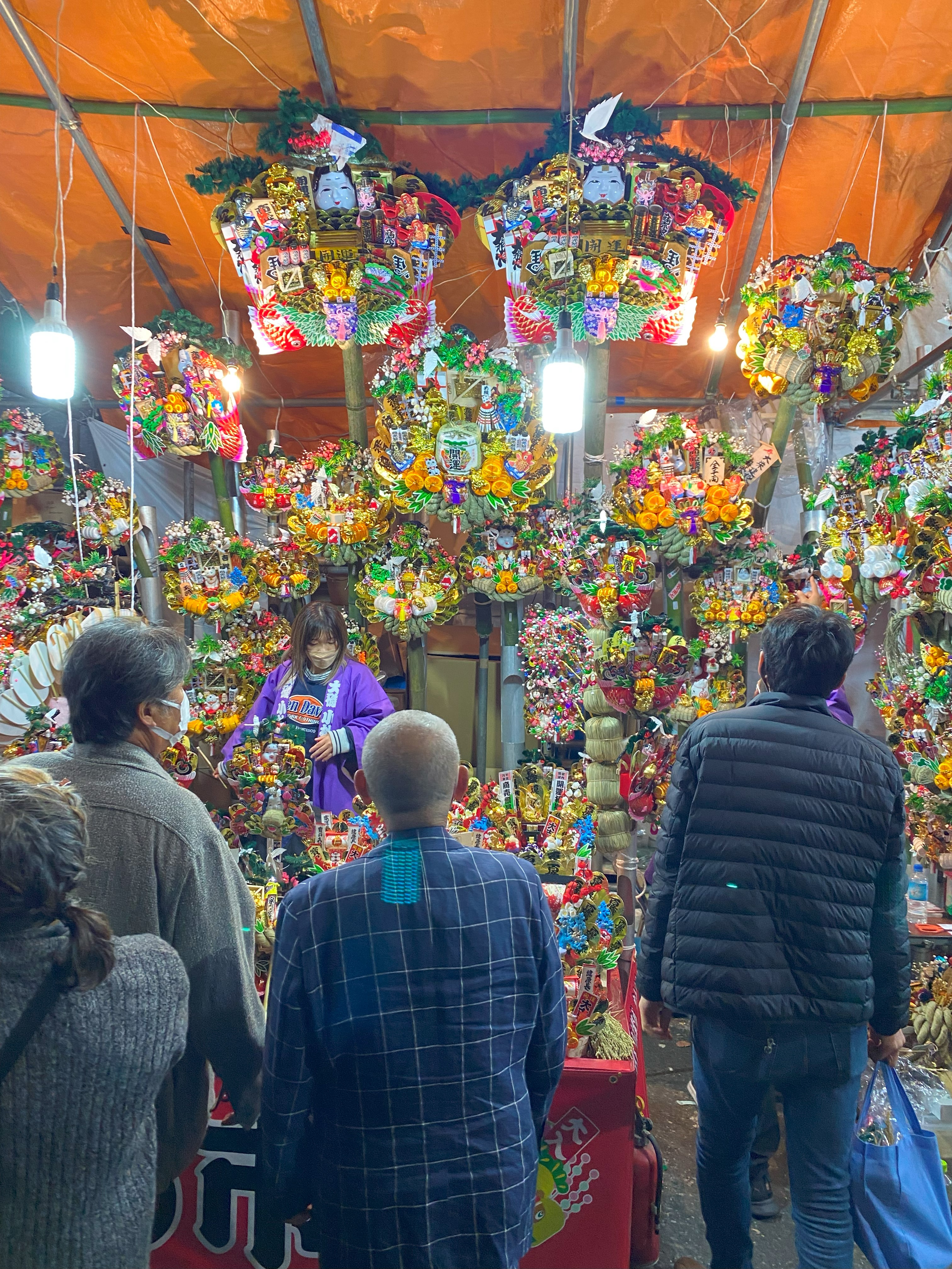 Matsuri had many stalls selling 'broom' - to sweep in good fortune.