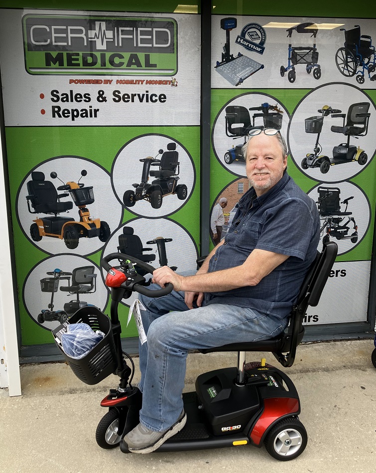Mr. Cramer with his new scooter