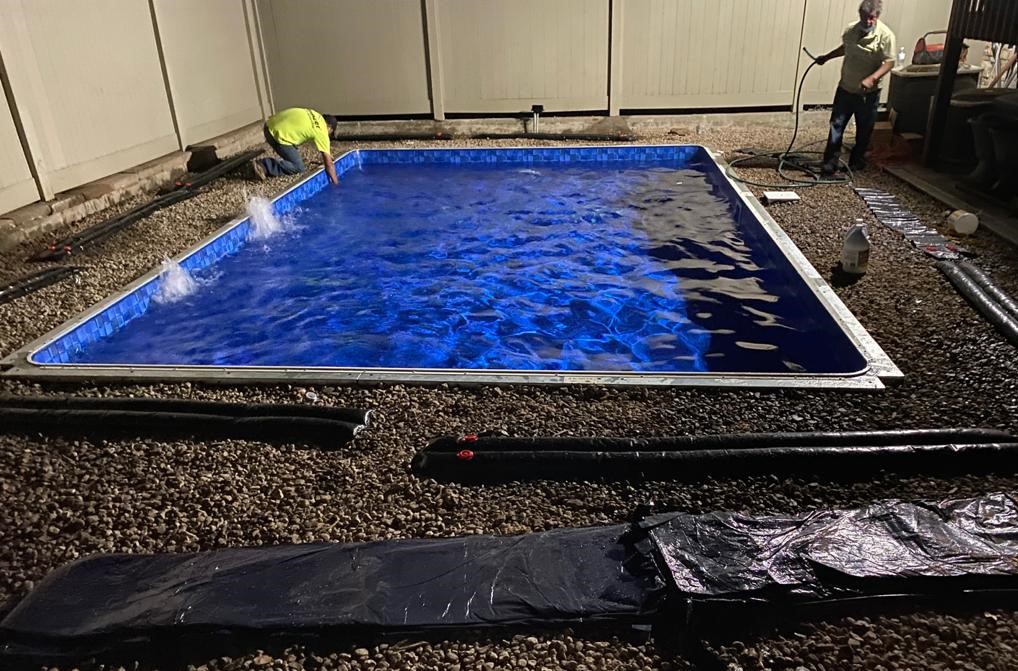 Contractors Working on a Swimming Pool