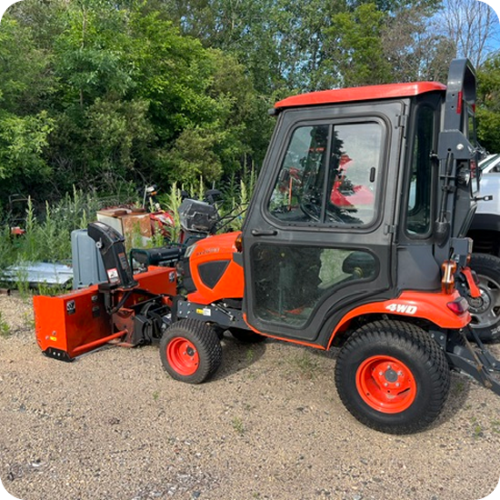 A red and black tractor