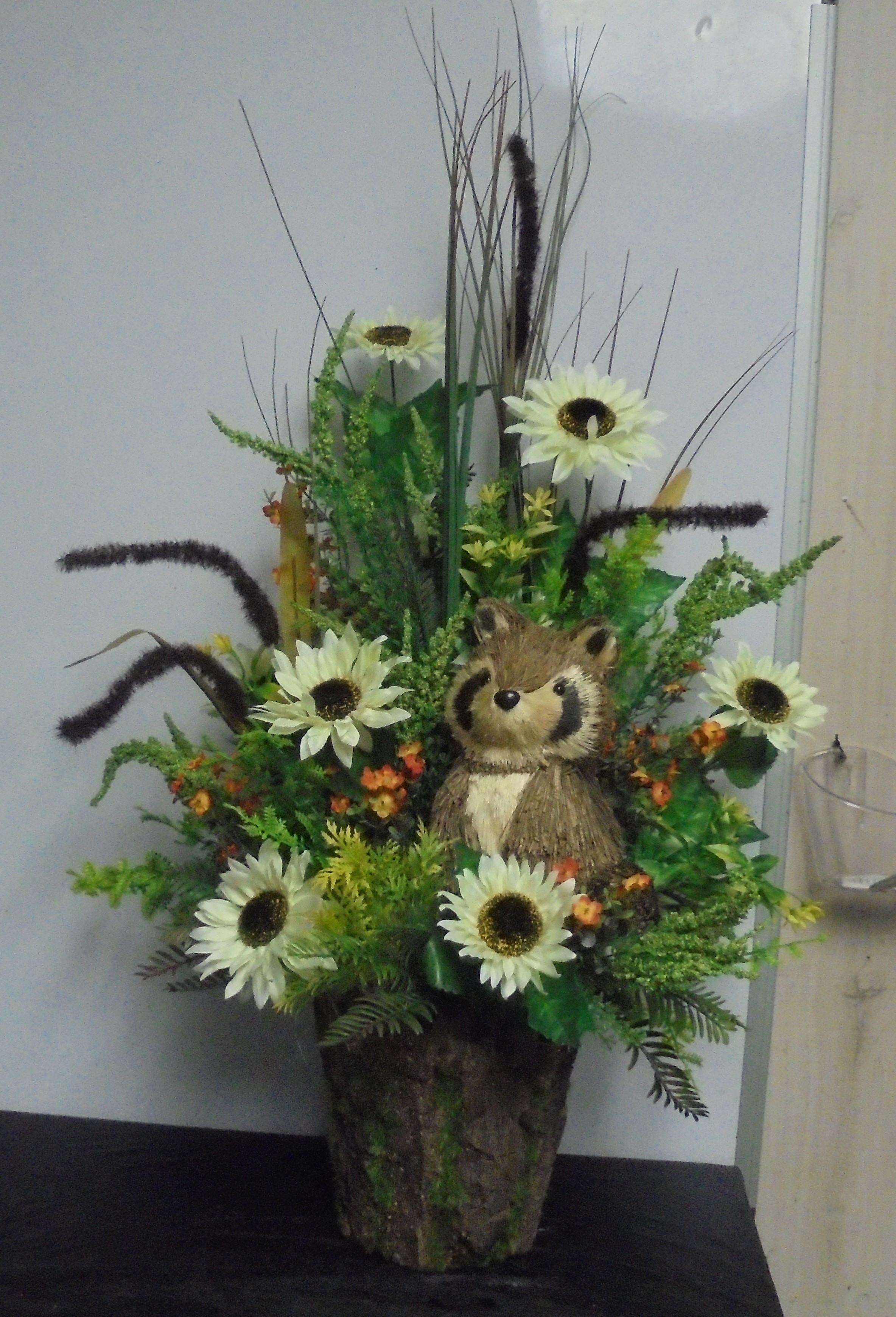 (52)  "Silk" Raccoon Arrangement
$75.00
