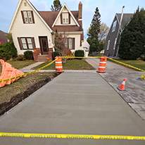 A driveway with yellow tape