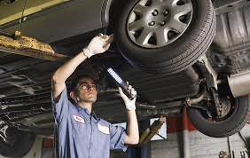 Hands over a car model