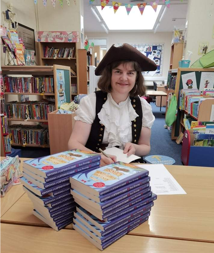 Susan Brownrigg with her books