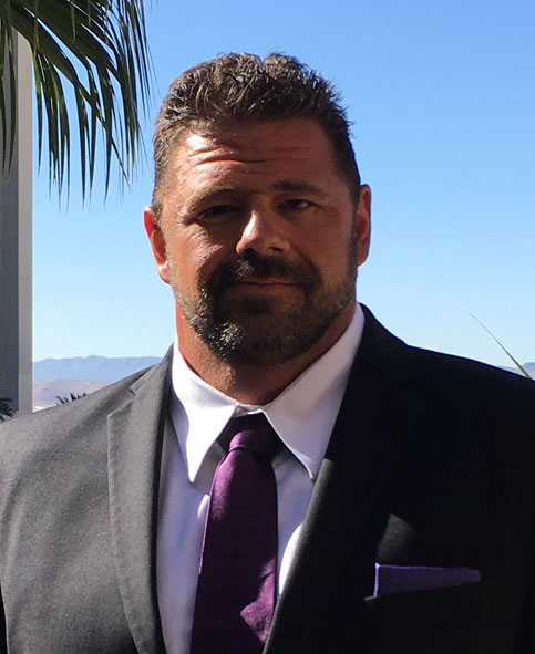 Smiling businessman in a suit