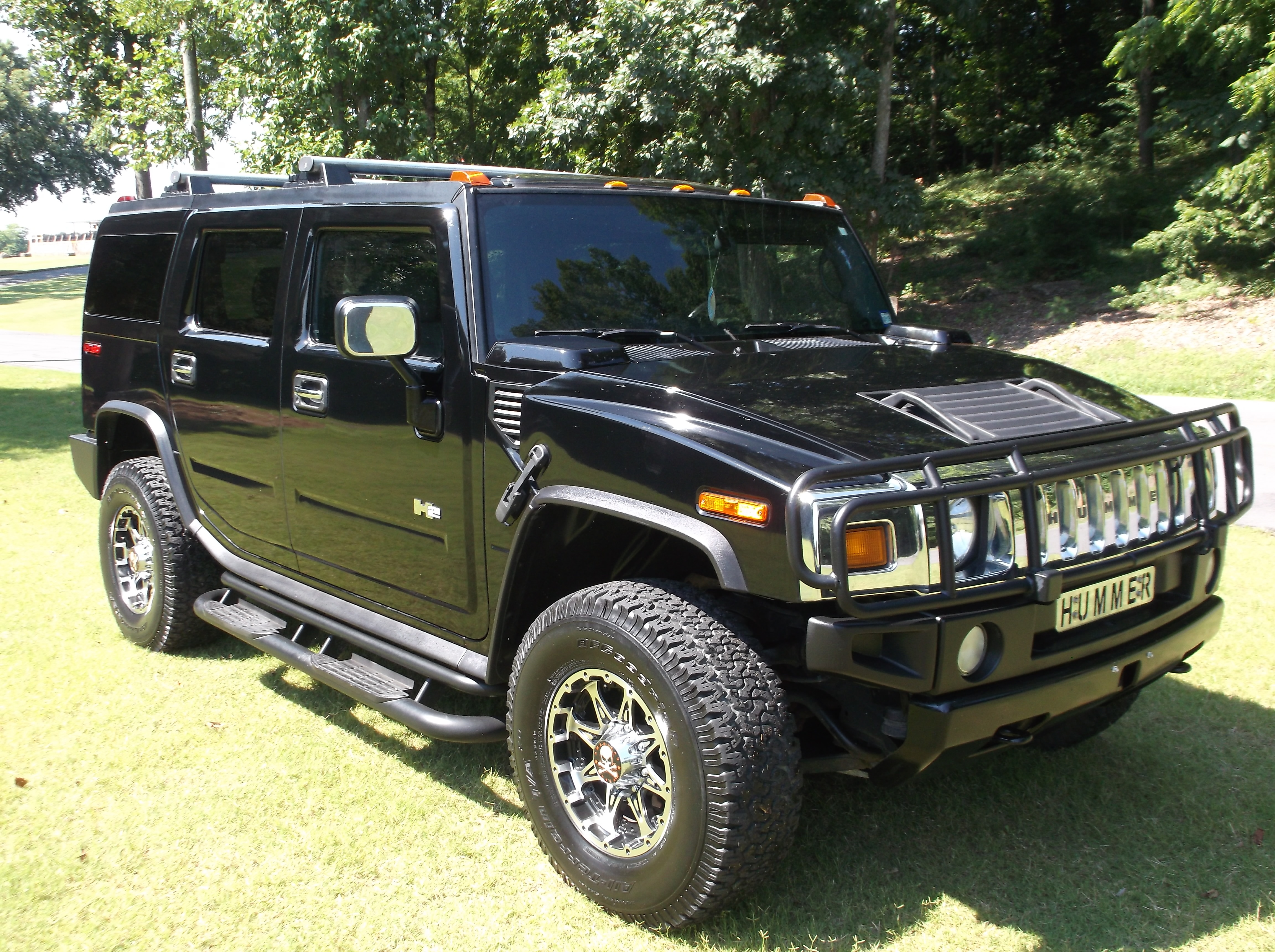 https://0201.nccdn.net/1_2/000/000/0bd/97e/2003HummerH2Black_0078-4608x3440.jpg