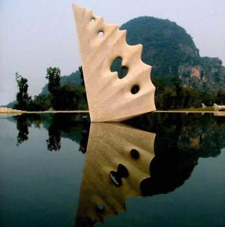 Flight on the water, granite - Yuzi Paradise, Guilin, China