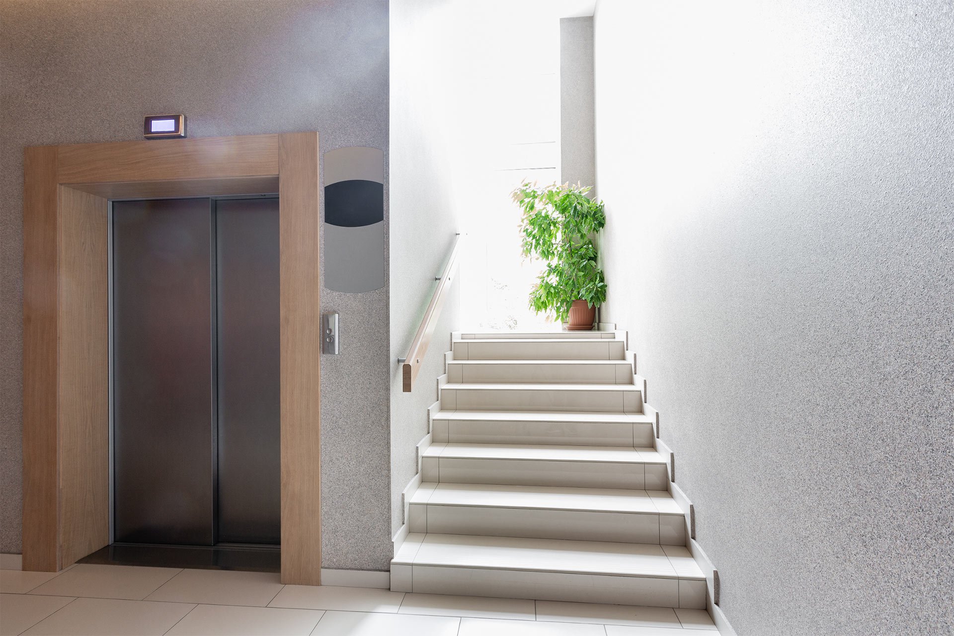 residential elevator next to stairs residential elevator next to stairs