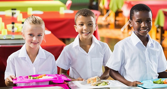School Kids Having Lunch During Break Time