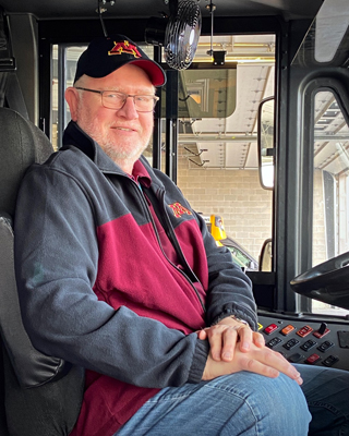 Les had been driving for 10 years, prior to starting with us at our Waconia facilities in 2019.

Les is one of our main field trip & events drivers who really knows his way around the Twin Cities and metro area! Les said that he really enjoys driving a bus.

When he’s not behind the wheel, he likes watching the Nascar boys drive, as well as watching drama shows on TV.