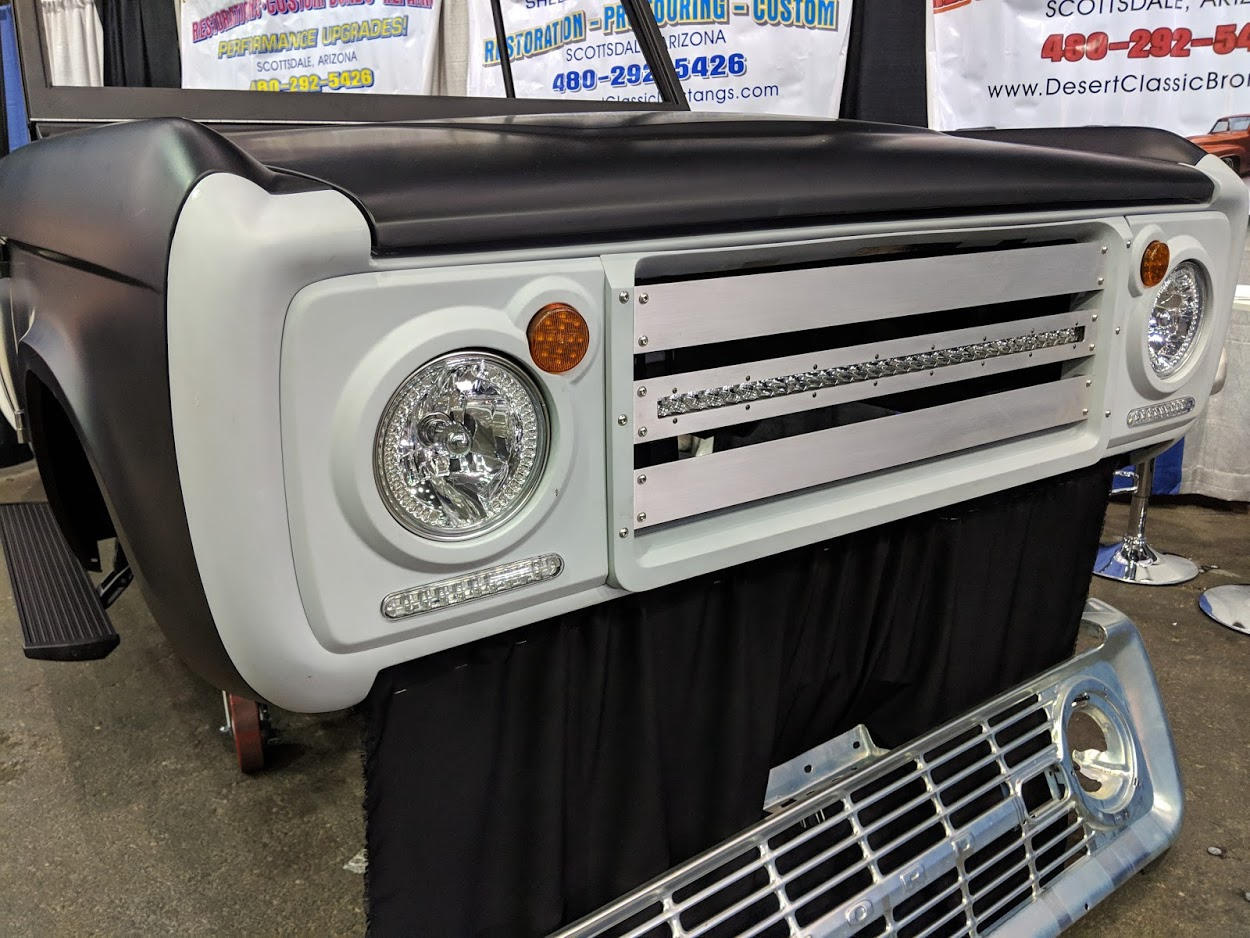 Aluminum Center with light bar. Headlight covers with puck lights and bottom light bar.