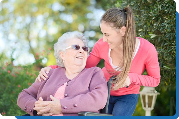 Senior lady with caregiver