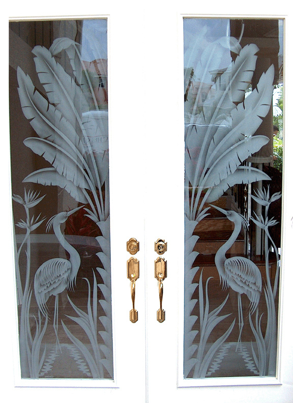 Etched herons on entry door by Pierce Lindsey Glass