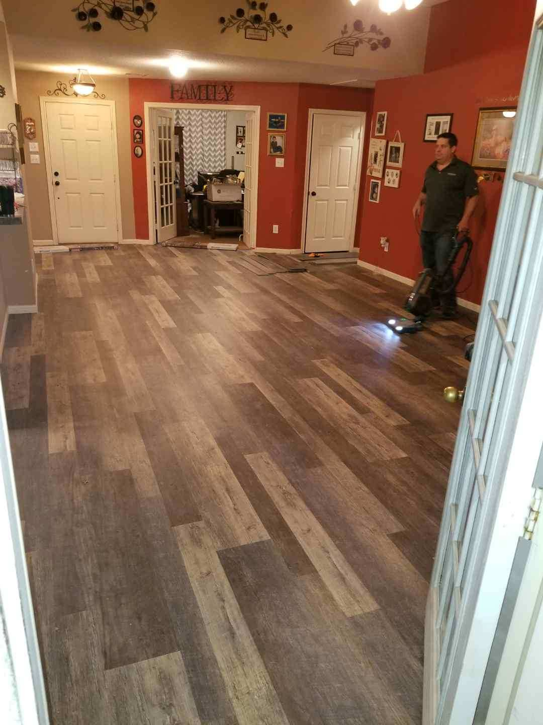 Removed carpet and installed Vinyl Plank flooring - Alleyton, Texas