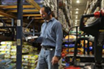Man Holding a Barcode Reader