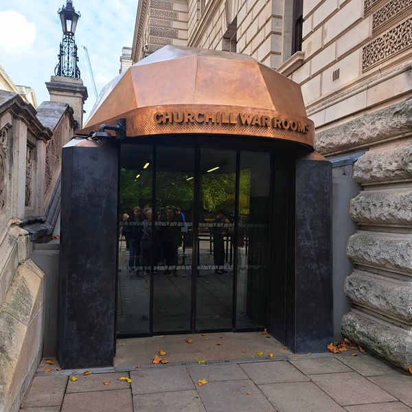 Patination refresh to The Churchill War Rooms bronze entrance canopy.