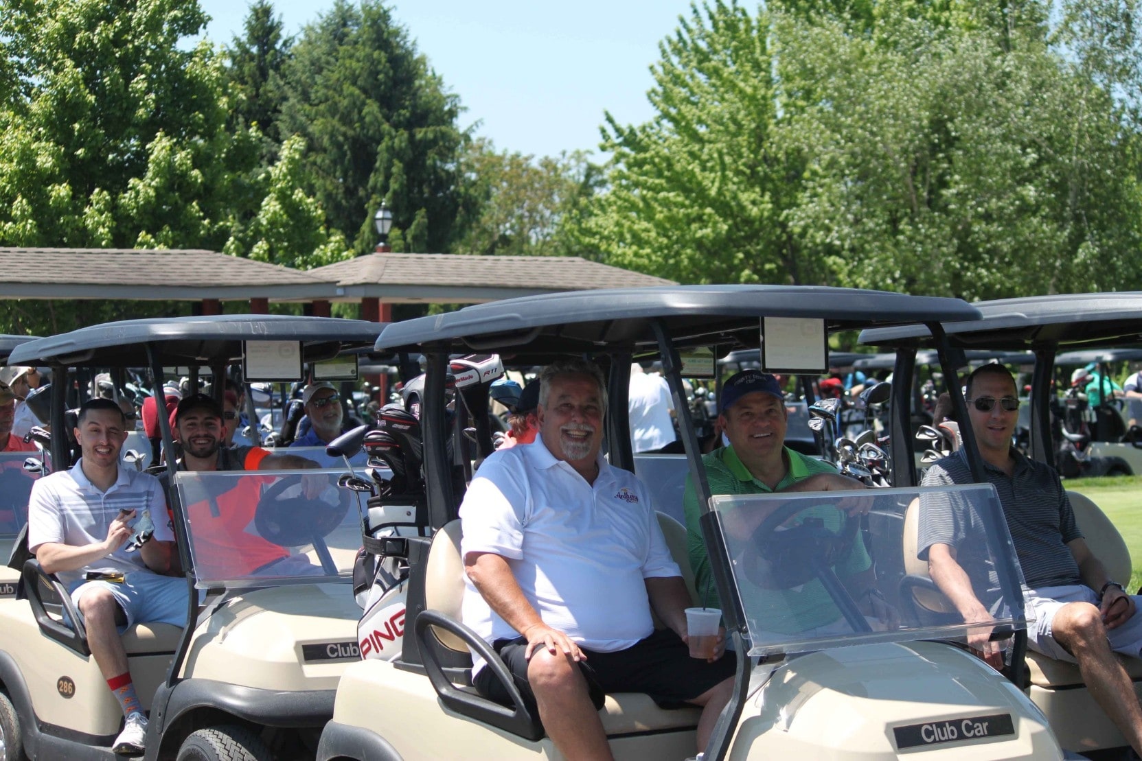 Golfers Riding Golf Carts