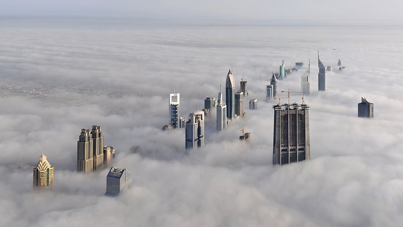 Buildings above clouds