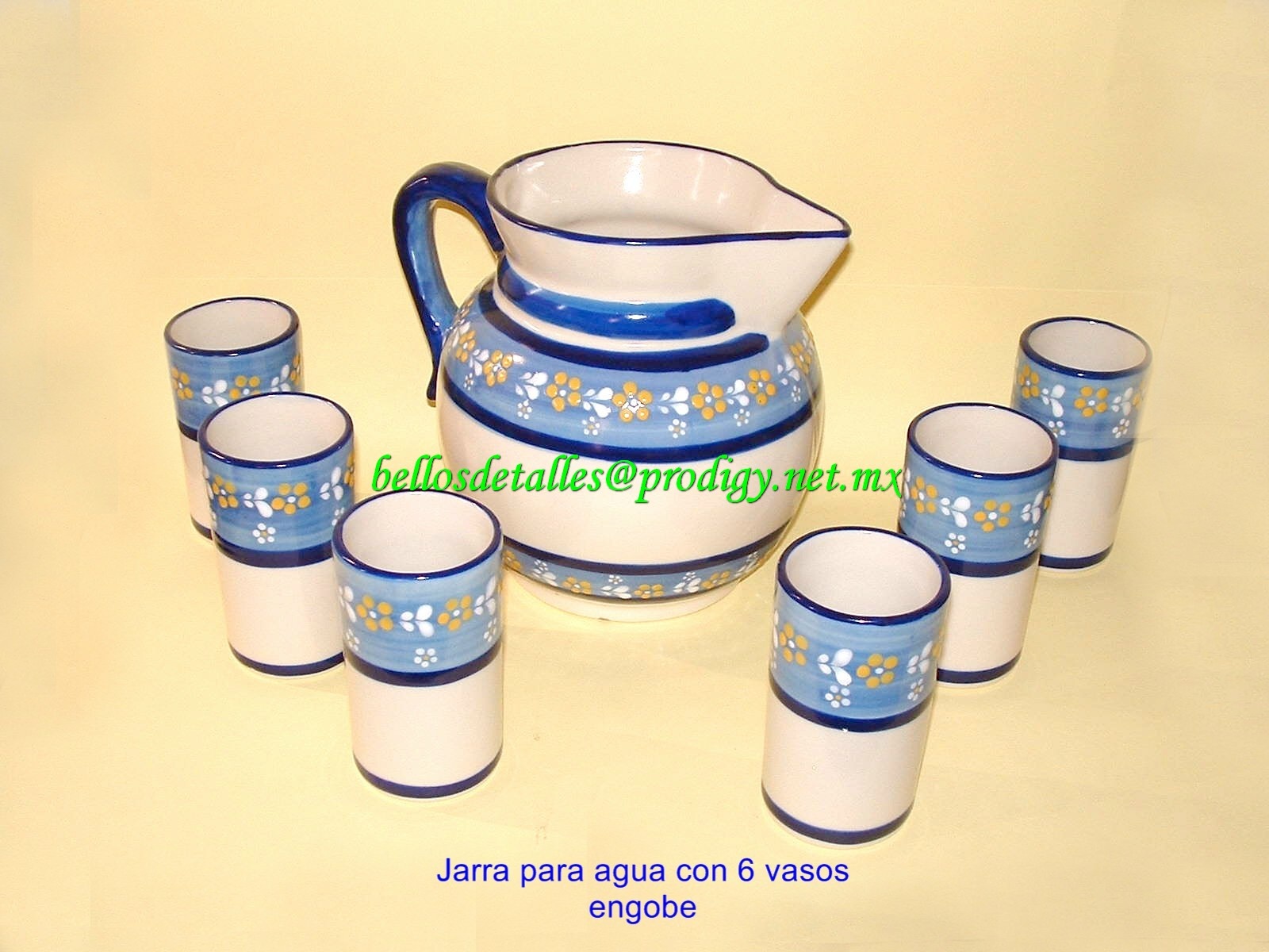 https://0201.nccdn.net/1_2/000/000/0cb/04d/Jarra-para-agua-y-6-vasos-engobe-1600x1200.jpg