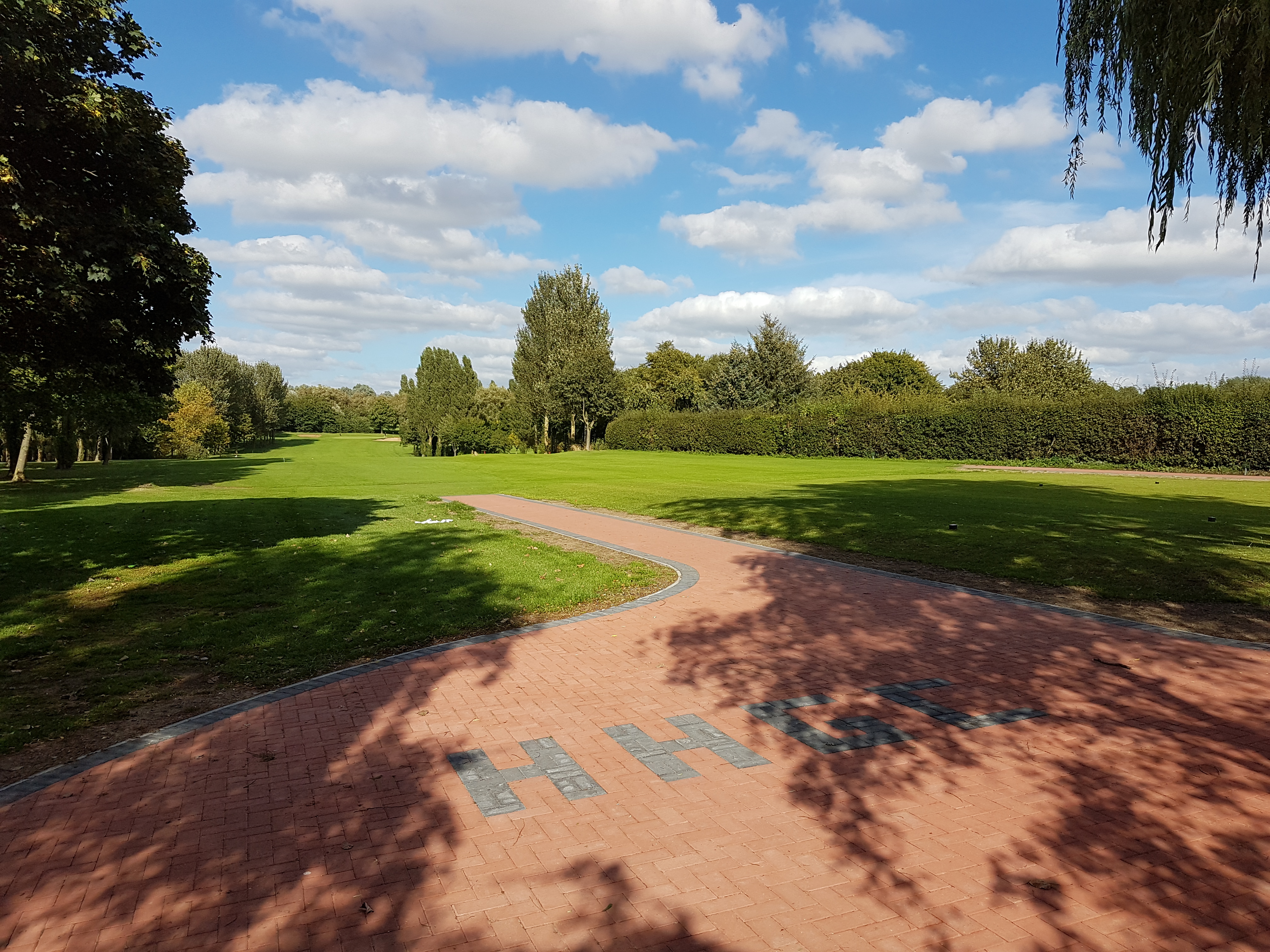 Hole 1: Page's Pride


The 1st hole is a 363 yard par 4. On the tee the fairway looks wide and straight, but with ditches to the left and right as well as water 200 yards off the tee box getting your club selection right and just left of centre will give you the best approach to the green.