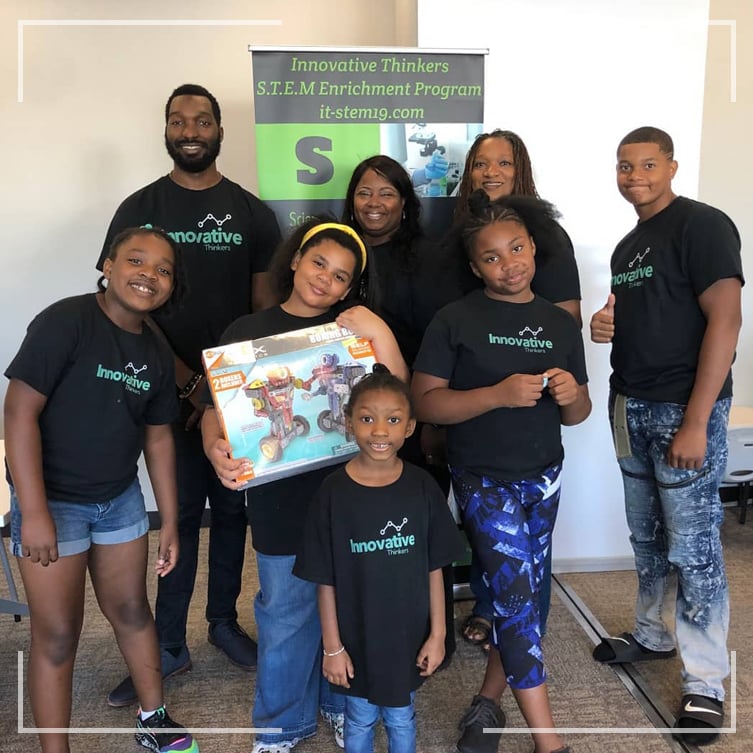 Students and teachers together with matching tshirts