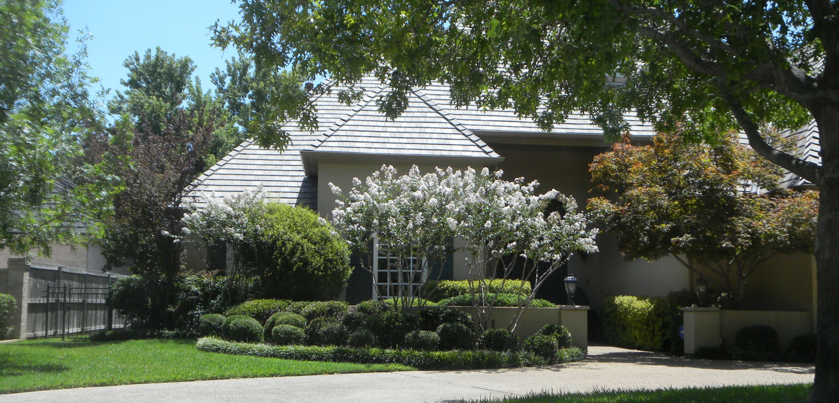 Is this your style? It has a midwest feel with a lawn and a simple foundation planting around the house. We typically do designs that suit our climate better, but it’s good to know what you like. 
