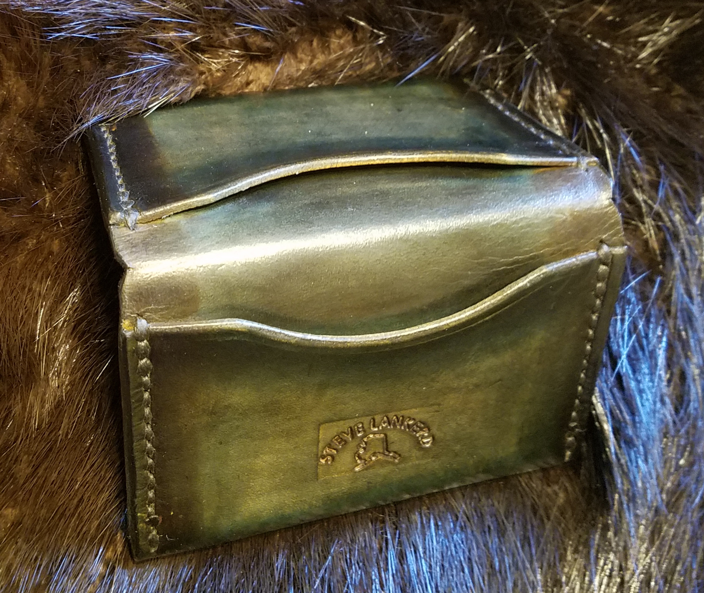 4 pocket minimalist wallet, hand stitched,  $65.00
