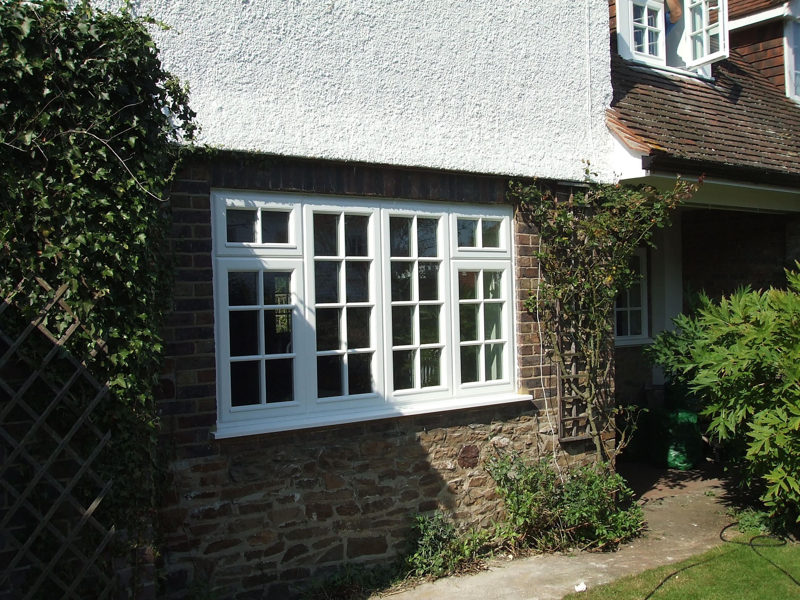 person writing on white paper