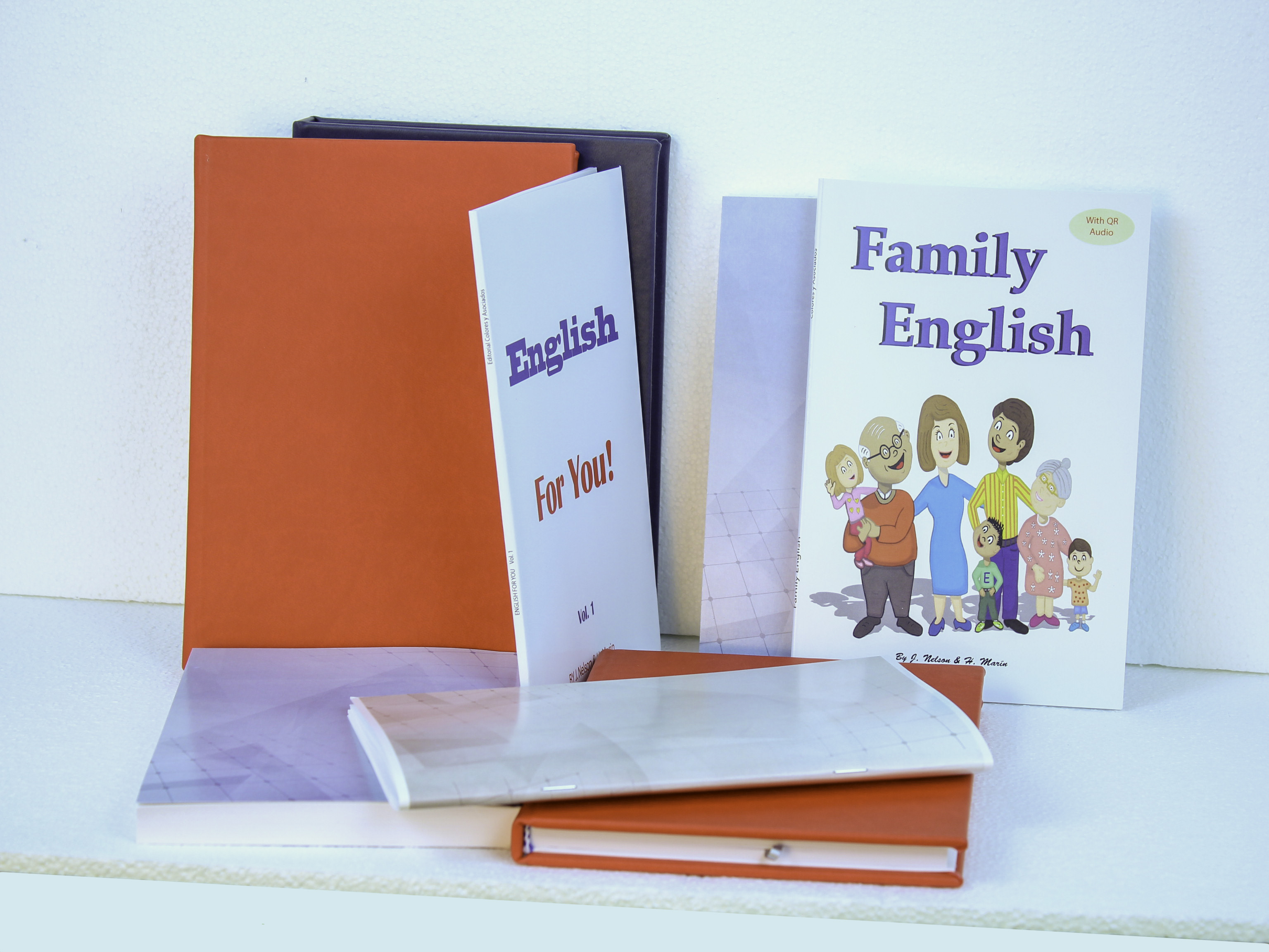 Happy kids holding notebooks