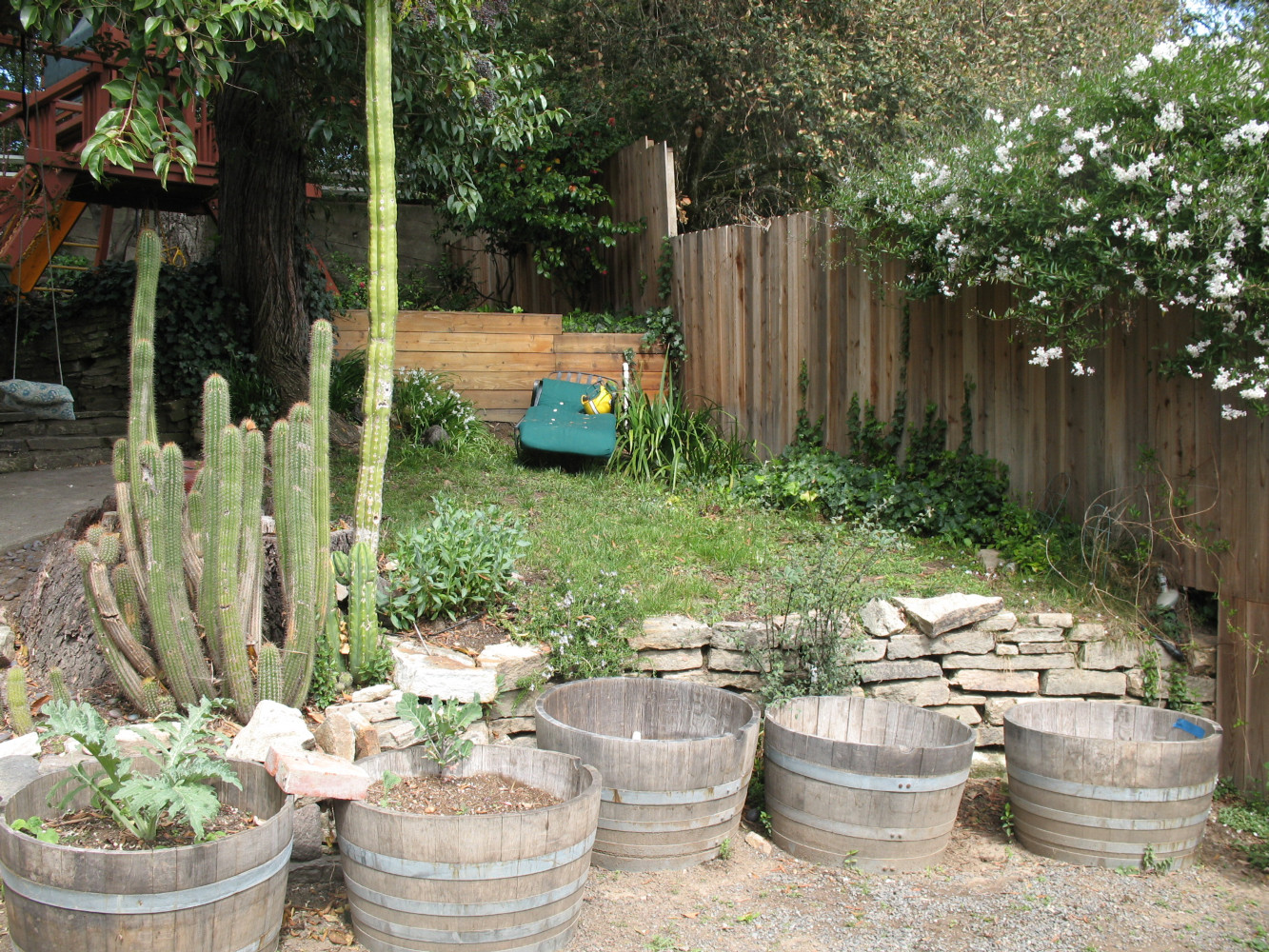 BEFORE - uneven grassy area