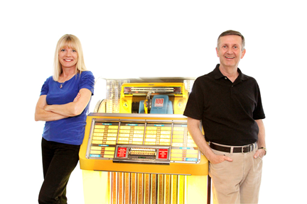 Marti Smiley Childs and Jeff March with 1951 Seeburg 100c Select-O-Matic jukebox