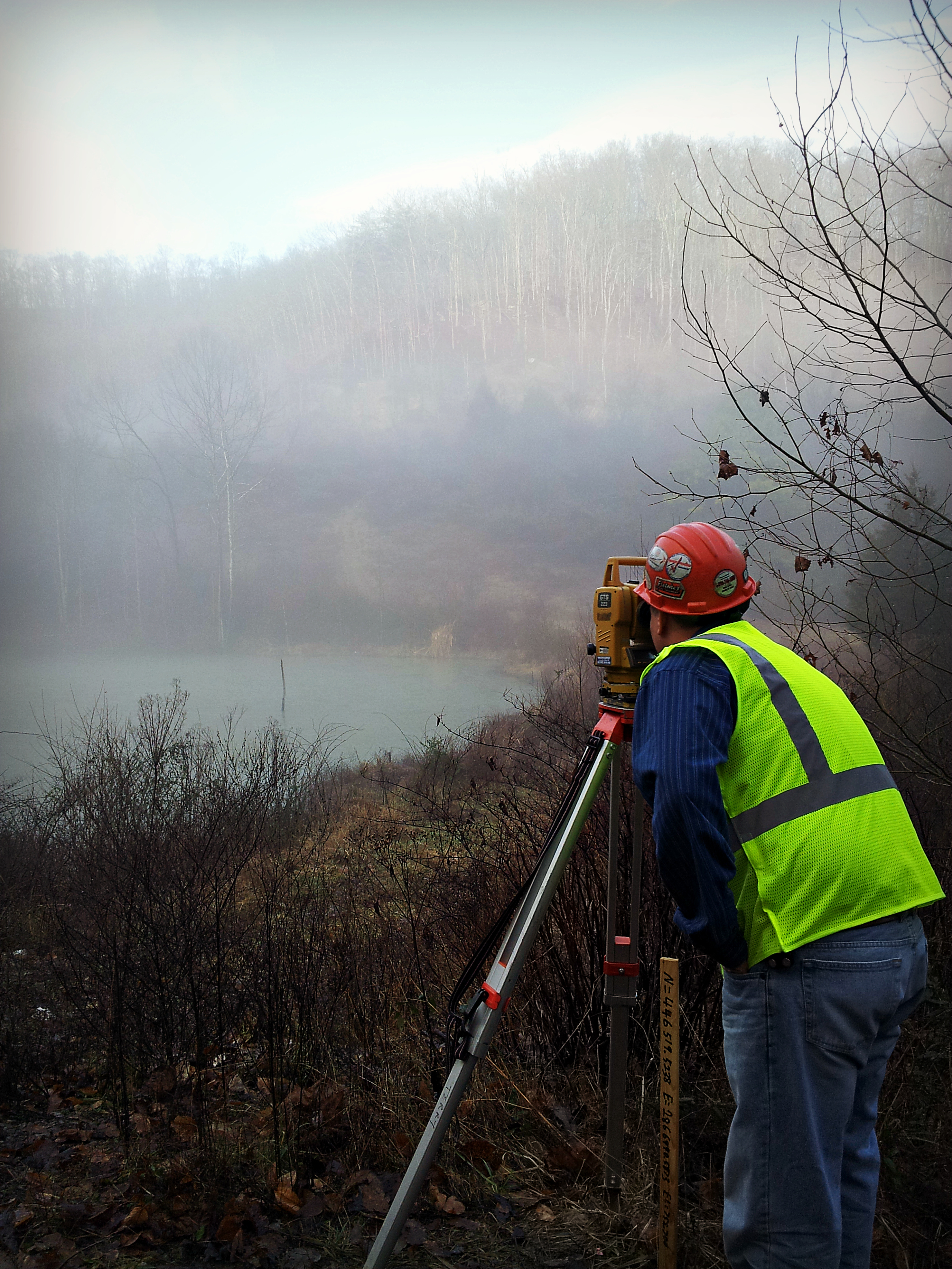 Land surveyors working in Kentucky, Virginia, West Virginia, Appalachian mountain range. Land surveyors working in Kentucky, Virginia, West Virginia, Appalachian mountain range.
