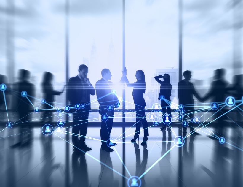 Silhouette of business people in an office
