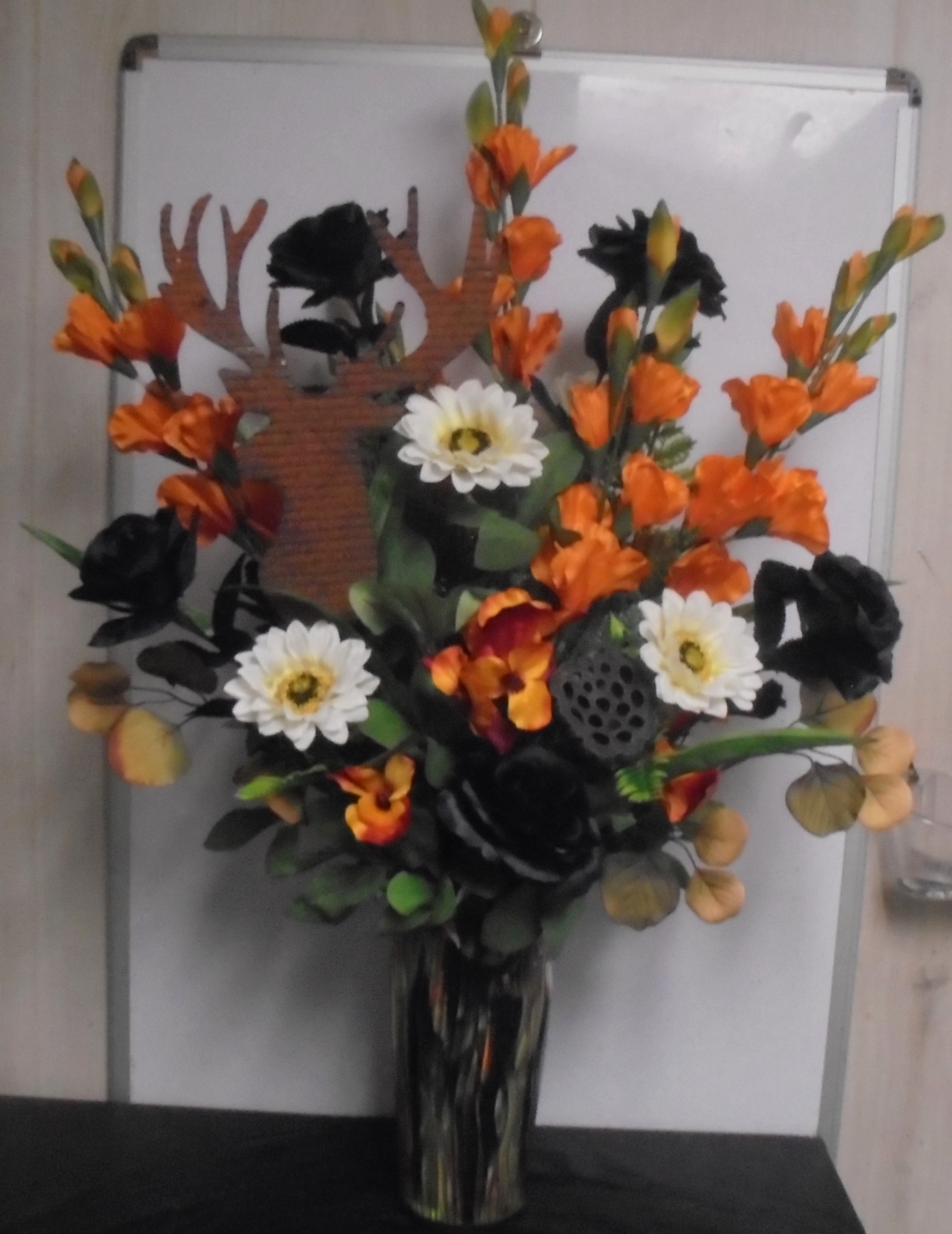 (46) "Silk" Camo Vase Arrangement
W/ Deer Head
$100.00