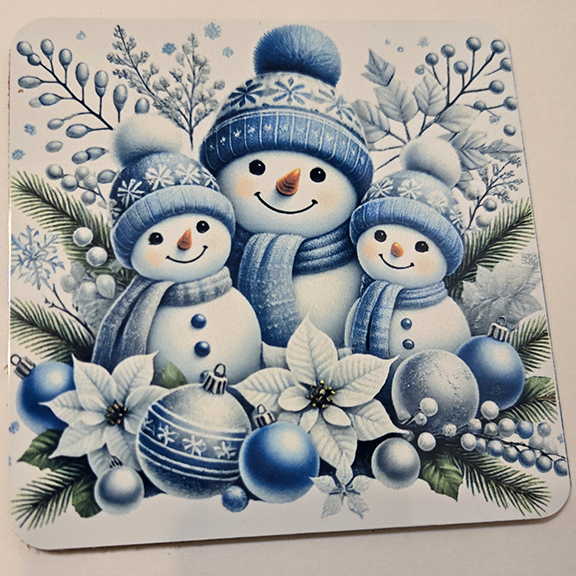 Square metal coaster with a snowmen design