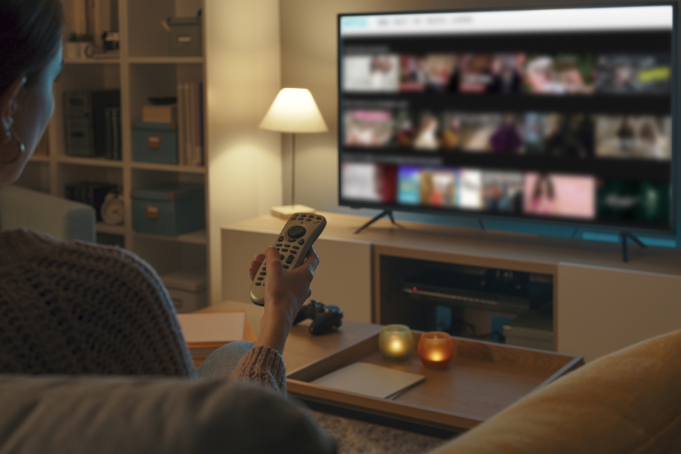 Hand using remote