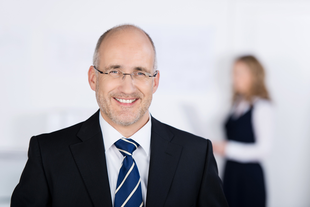 Smiling successful businessman