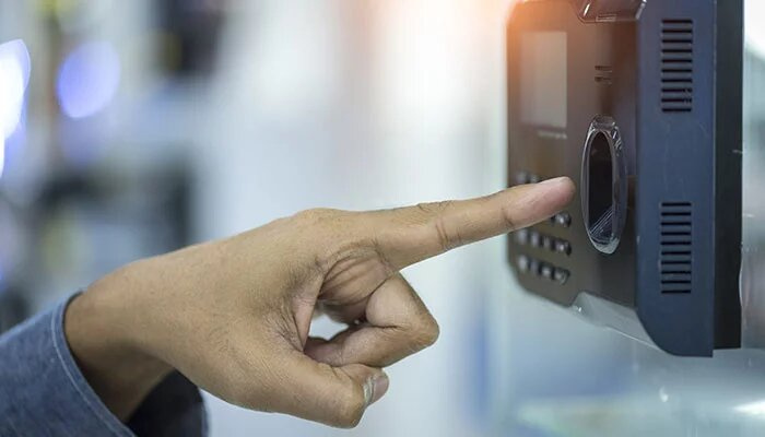 Hand Scanning Finger on Machine