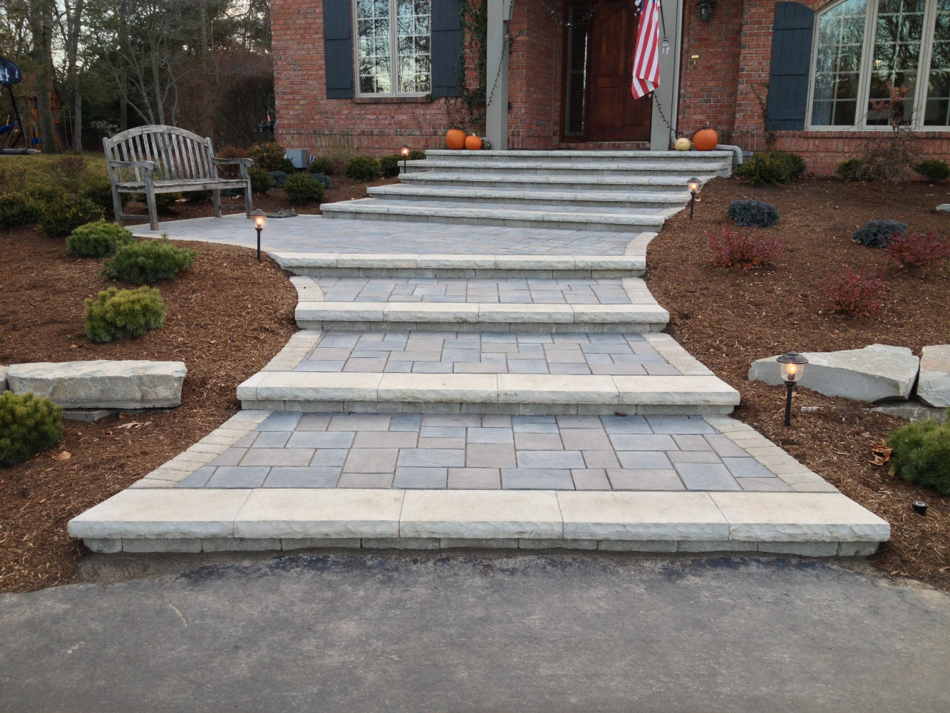 This new front entrance has high appeal.  Not to mention a heated system for snow melt.