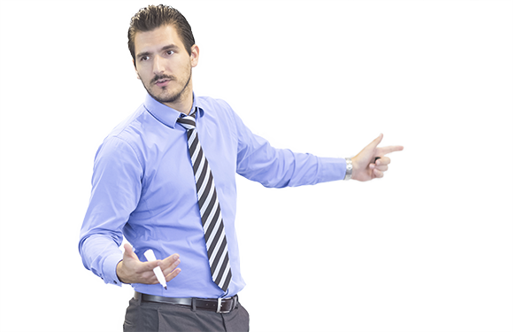 Smiling teacher holding a notebook