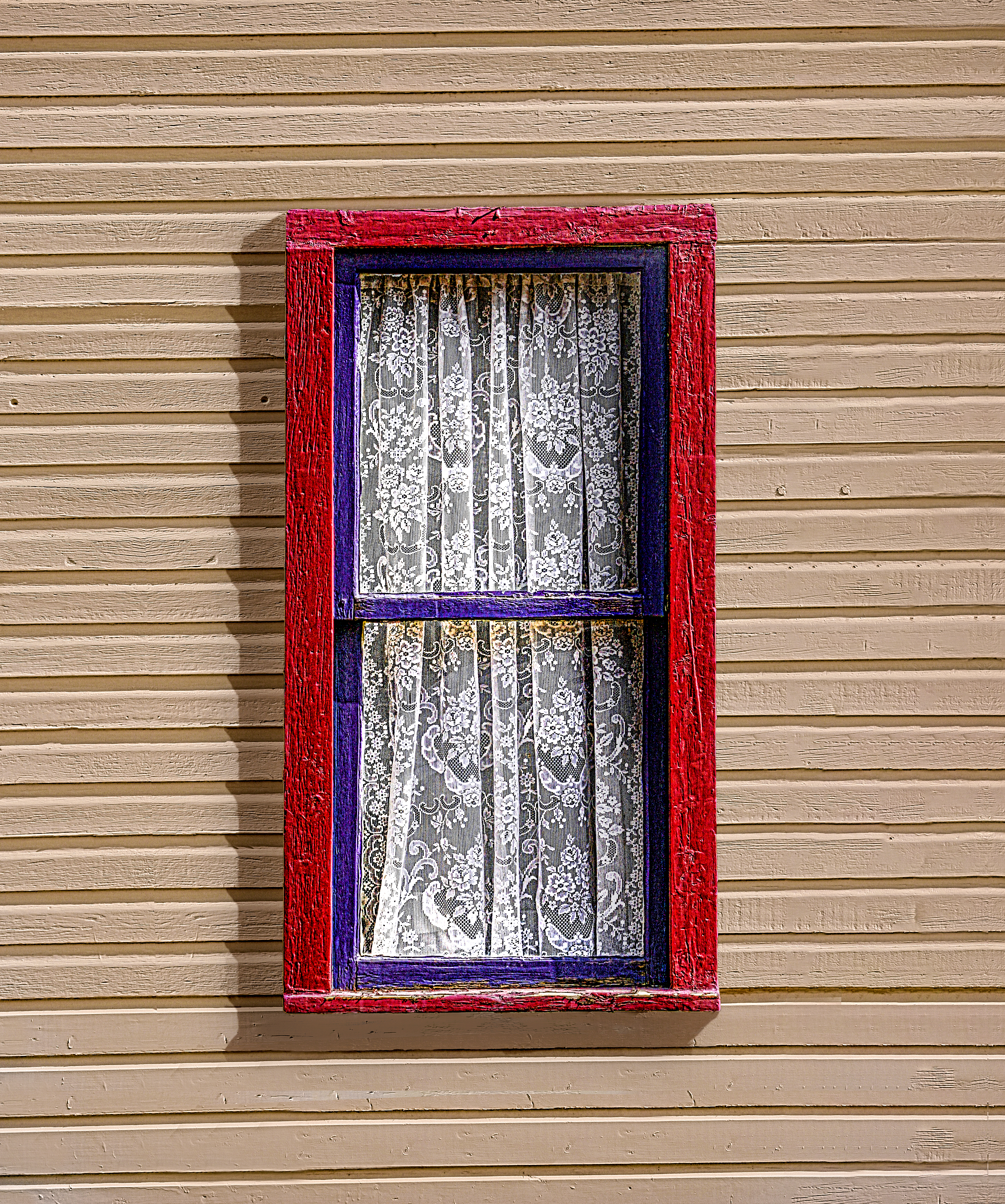 LACEY - Windows are often great photo subjects. Though simple, this one had it all... color, texture in the old siding and trim and of course, the lace.