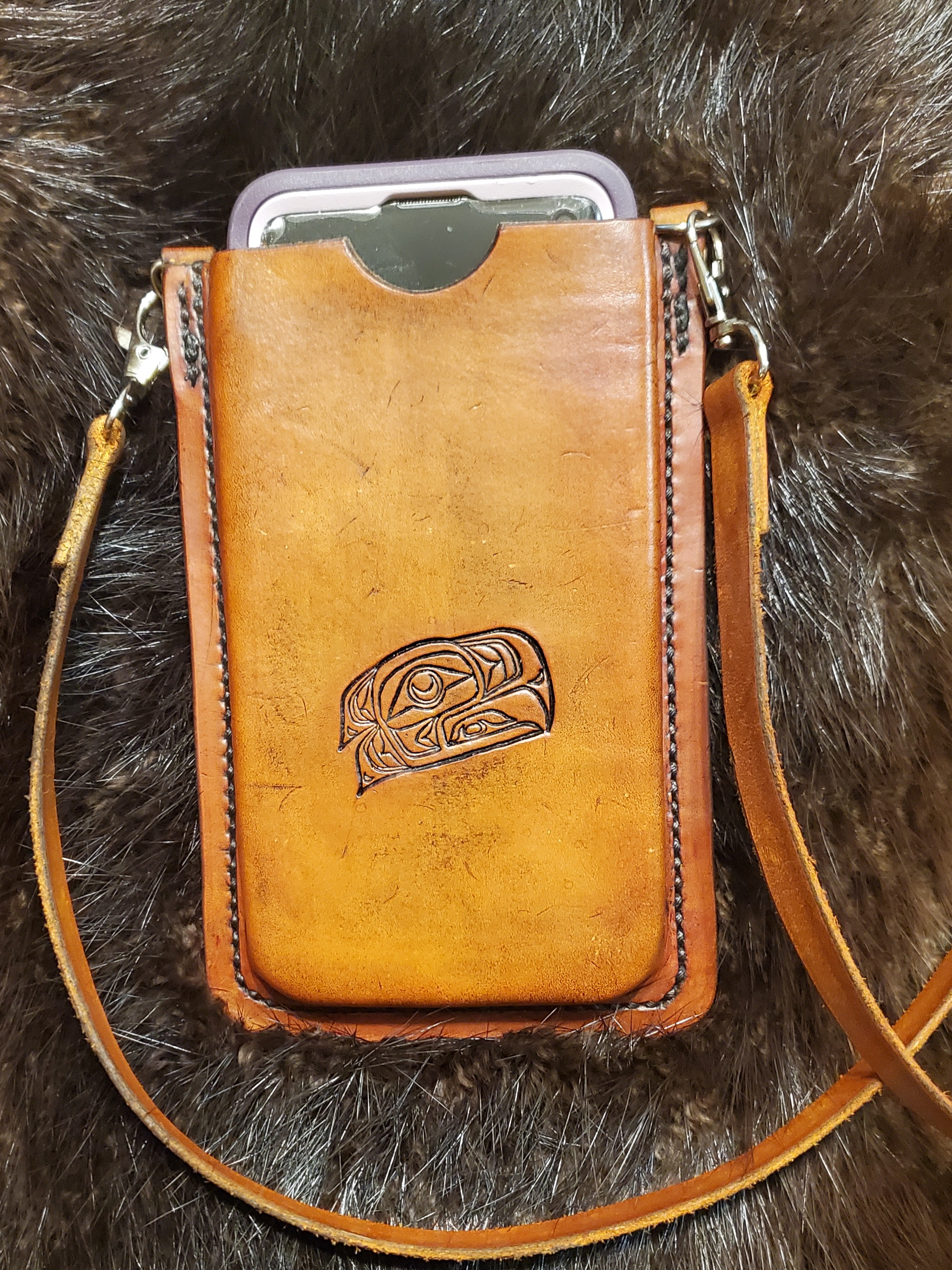 (Front)  Leather cell phone case with strap, hand tooled and hand stitched,  $85.00