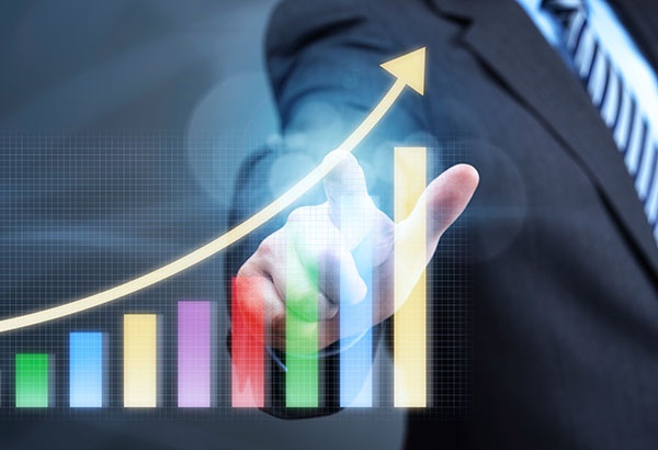 Red car in front of a sea landscape