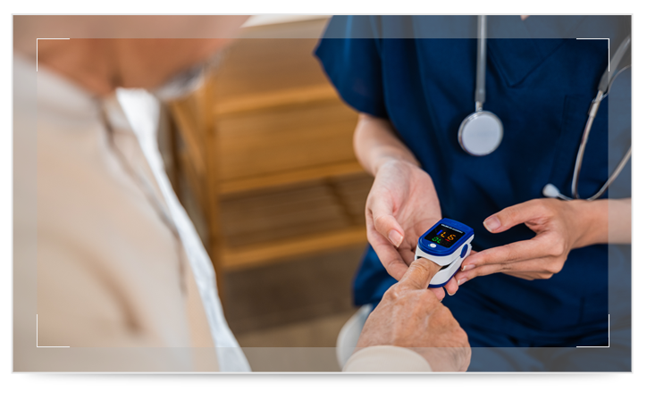 A doctor checking a patient's oxygen