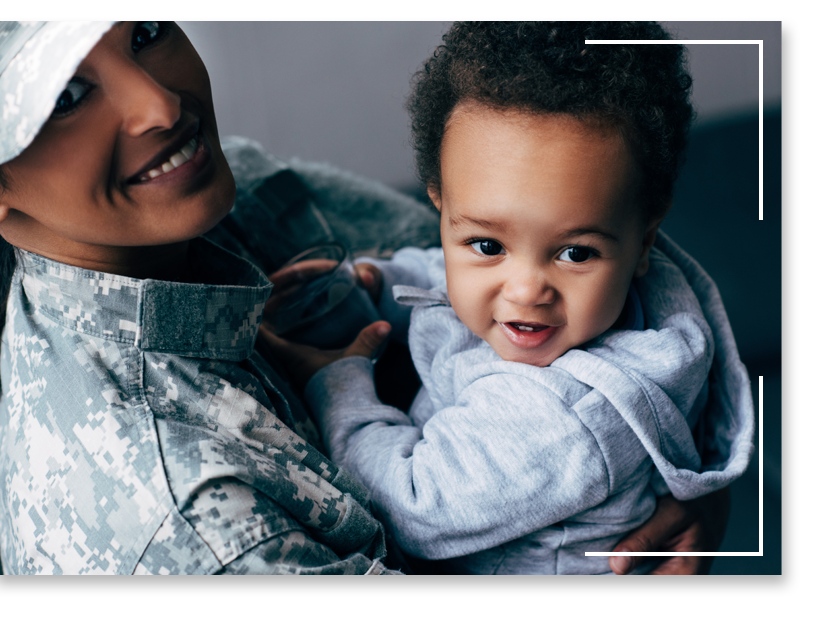 Military woman with young son. Military woman with young son.