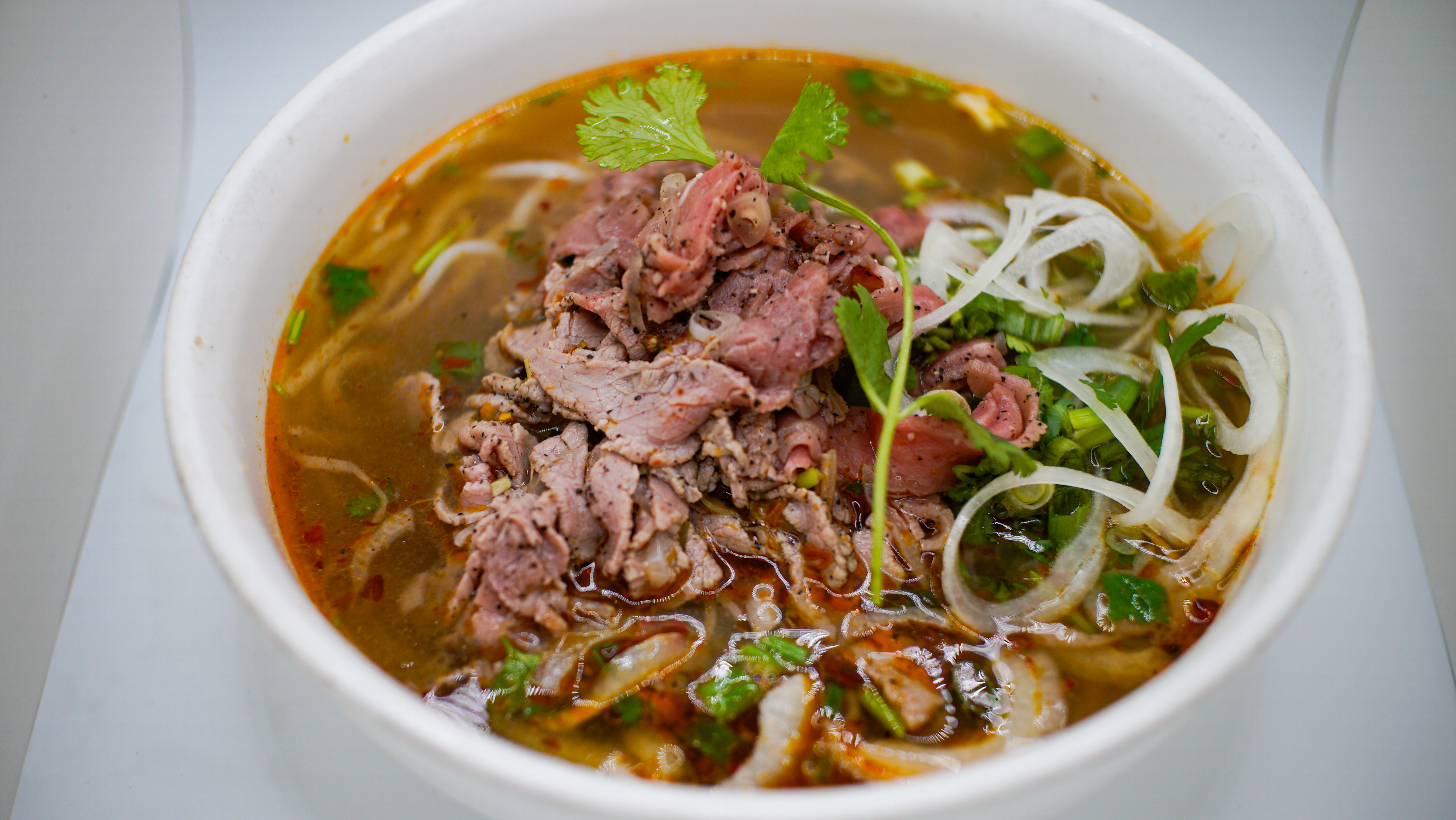 1S(B). BUN BO TAI
Hot and Spicy Beef & Pork Soup
W/ Marinated Steak and 
Thick Vermicelli Noodles