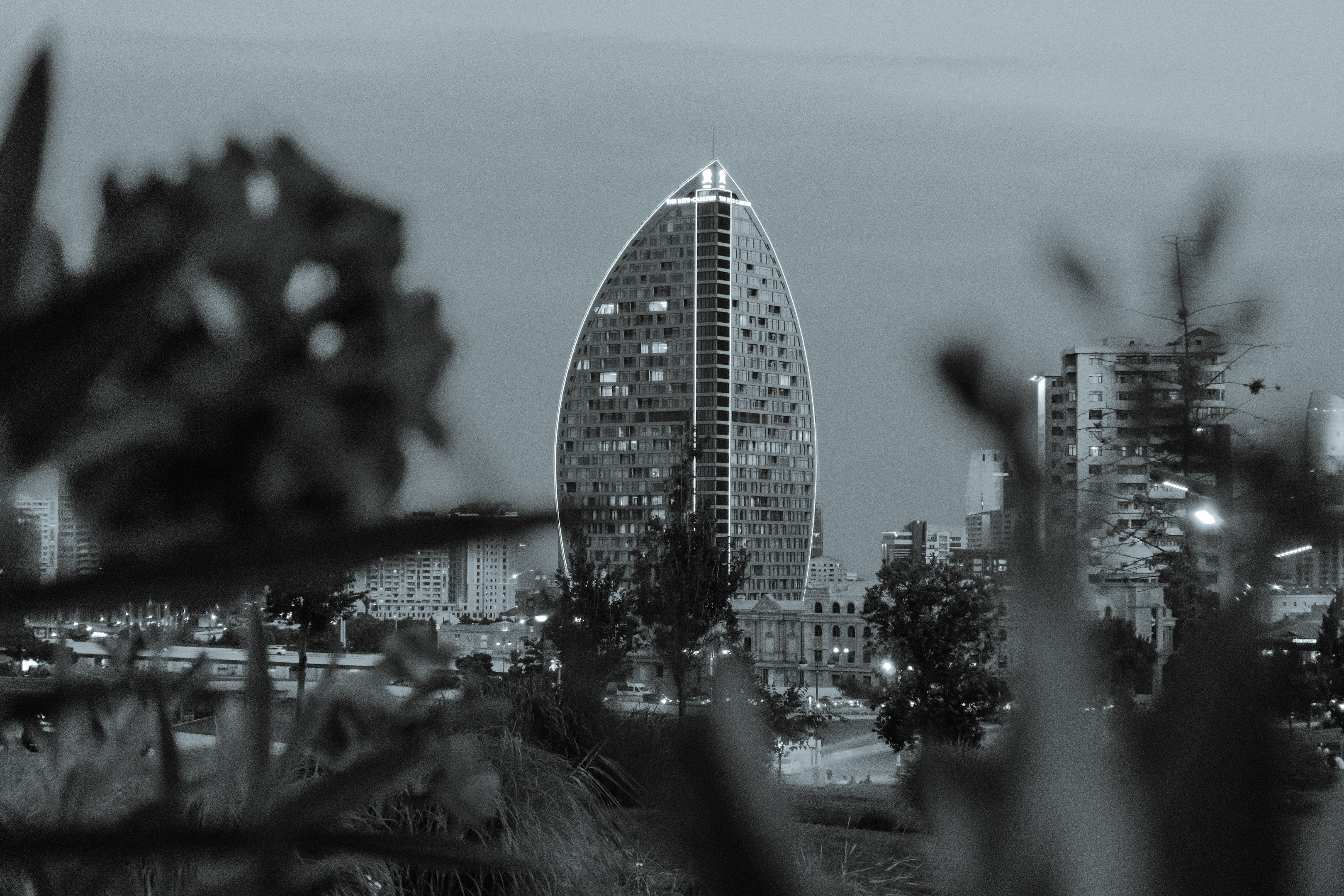 A black and white photo of a tall building