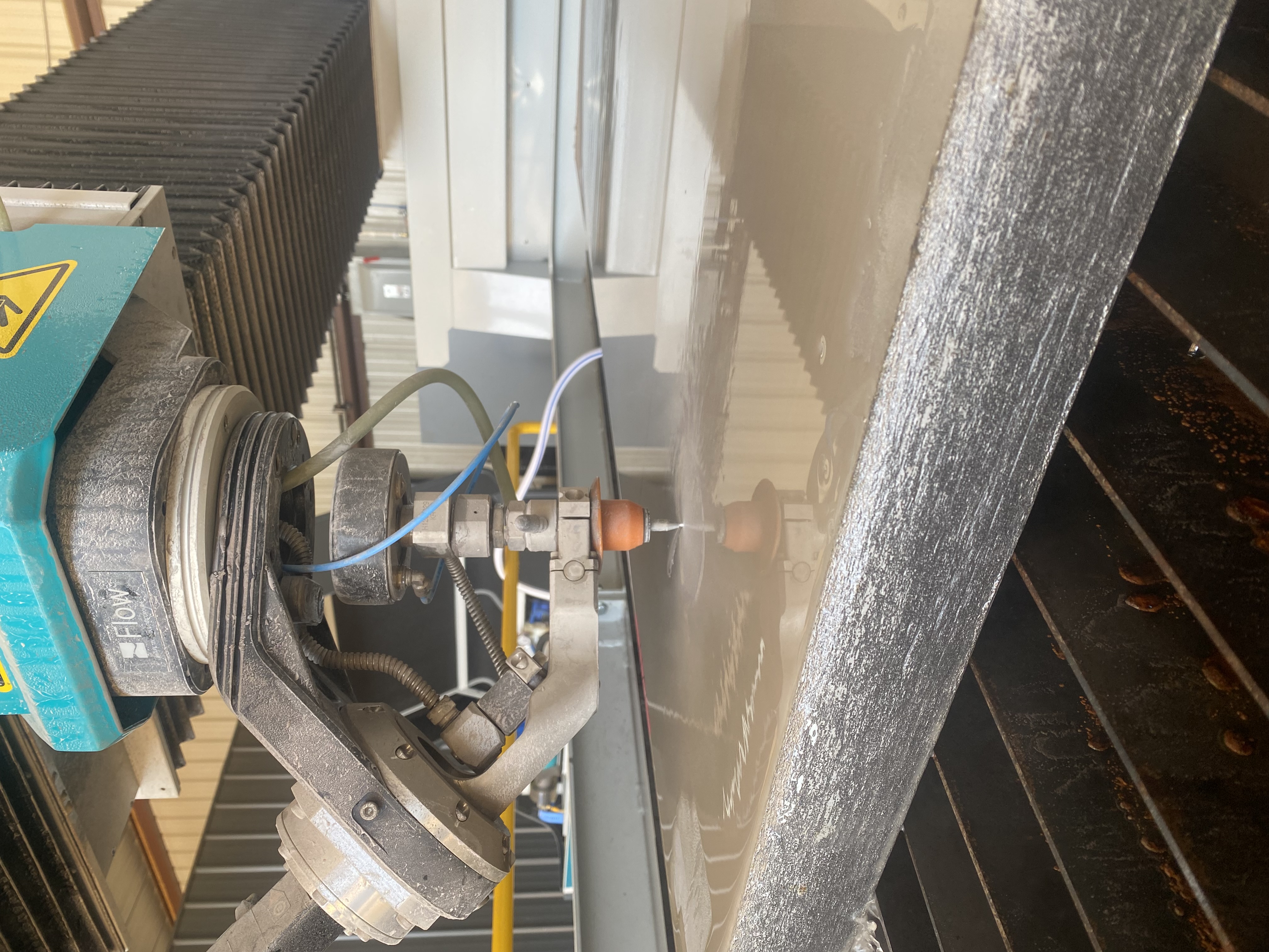 Waterjet machine cutting 2.25" stainless