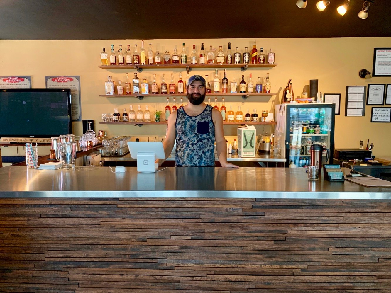 Santos at the Bar - Dueling Grounds Distillery