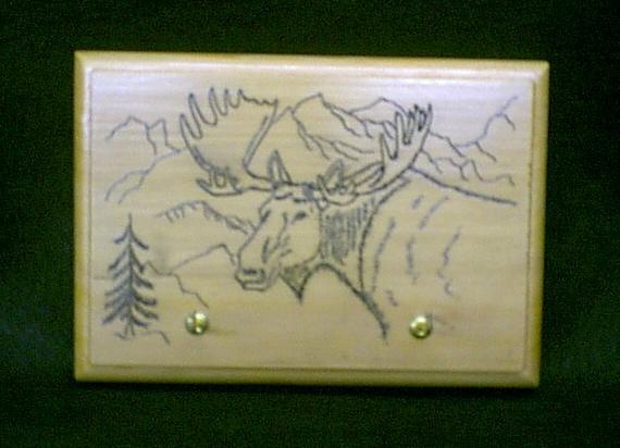 Hand engraved Moose on Sitka Spruce plaque with key hooks... Not a cheap laser imitation... $55.00    Sold but I can always make another...